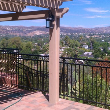 Judd's Deck Renovation and extension with wrought iron.