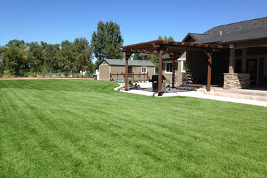 Inspiration for a large southwestern full sun backyard landscaping in Denver for summer.