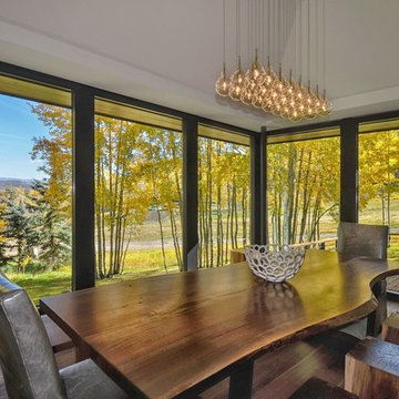 Mountain modern Dining room with Custom Walnut Table