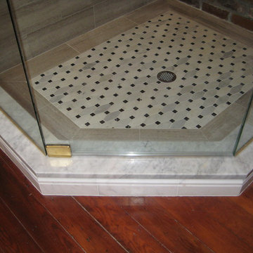 Master Bath Vanity, shower threshold, and kneewall cap: Carrera marble