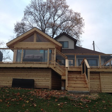 Chain O' Lakes Cedar Room Addition and Cedar Deck with Glass Railing