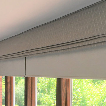 Family room motorized roller shades with custom valance