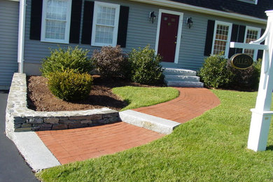 This is an example of a front yard brick landscaping in Boston.