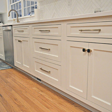 Chappaqua NY - Custom White & Navy Cabinets w/ Honey Bronze