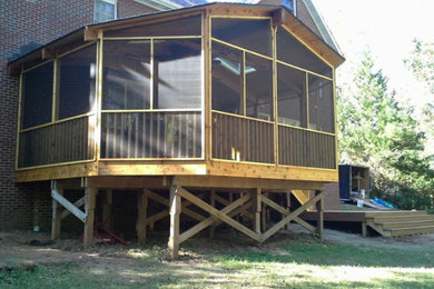 This is an example of a traditional porch design in Raleigh.