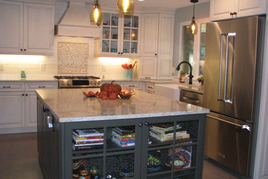 This is an example of a medium sized traditional kitchen in Denver.