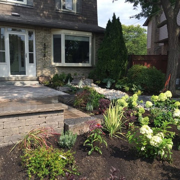 Front yard with no lawn and a lot of curb appeal