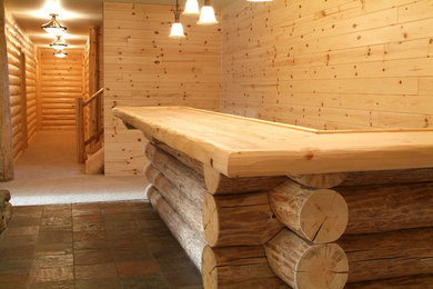 Mountain style home bar photo in Other
