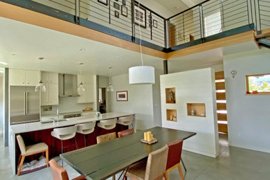 Example of a mid-sized minimalist home design design in Denver