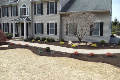 Photo of a mid-sized craftsman partial sun front yard concrete paver garden path in Philadelphia.