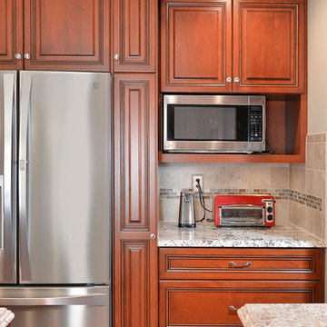 Cherry Kitchen with Cooktop Island in Manassas, VA