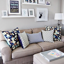 Floating shelves above couch