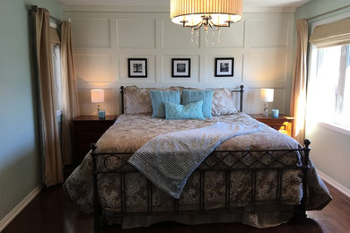 Example of a transitional bedroom design in Toronto