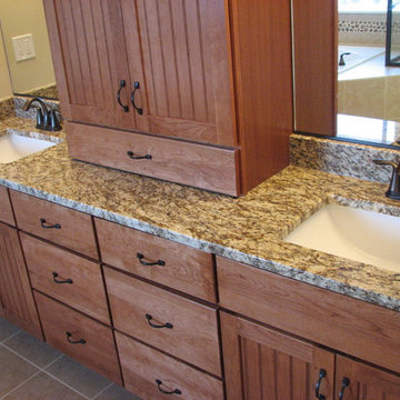 Amber Yellow granite on cherry pecan cabinets