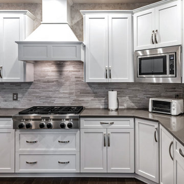 Contrasting White and Dark Gray Cabinets and Countertops in Crownsville, MD