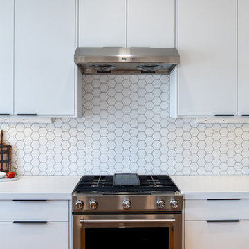 Sleek & Stunning Modern Kitchen with Geometric Backsplash