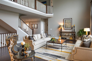 Large transitional formal dark wood floor and brown floor living room photo in Columbus with beige walls, no fireplace and no tv