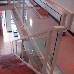 Steel stairs with glass panel - Products