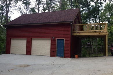 Inspiration for a large detached three-car garage remodel in Nashville