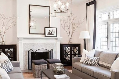 Example of a large trendy formal and open concept dark wood floor and brown floor living room design in Chicago with white walls, a standard fireplace and a stone fireplace