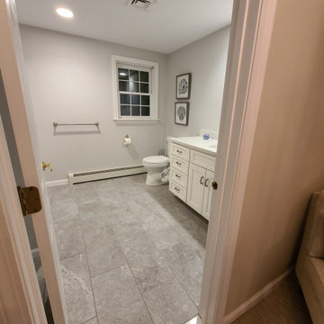 New tile, toilet, vanity & fixtures.
