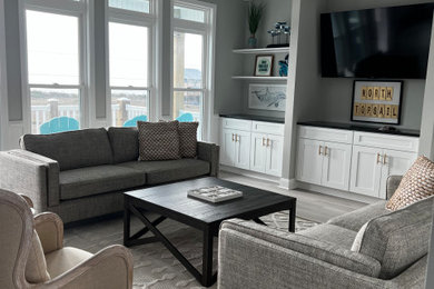 Example of a beach style family room design in Wilmington