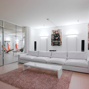 Inspiration for a mid-sized contemporary enclosed home theater remodel in Stuttgart