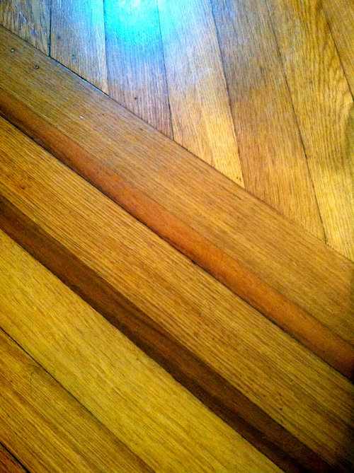 Coordinate sunroom area rug with living room area rug