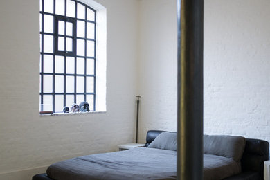 Inspiration for an industrial bedroom in London.