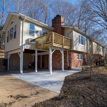 Wider view of sunroom and deck
