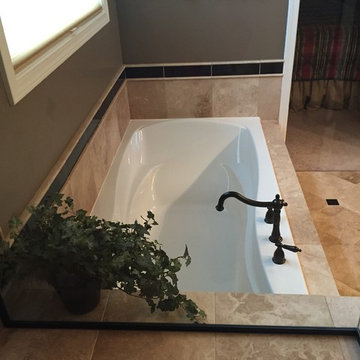 Custom Travertine Bathroom with Black Galaxy Accents