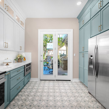Long view of kitchen towards French doors