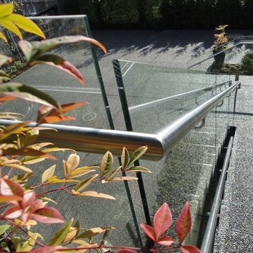 Topless glass railings & heavy glass shower doors