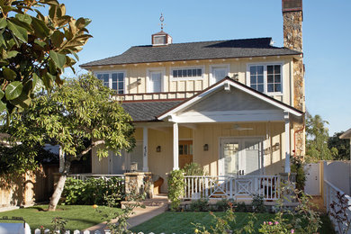 This is an example of a traditional exterior in San Diego with wood siding.