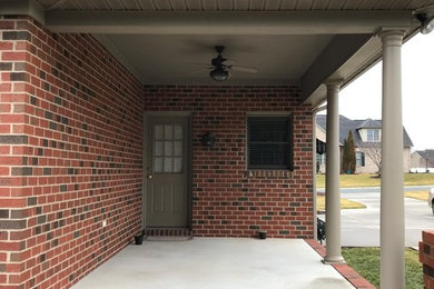 Example of a sunroom design in Other