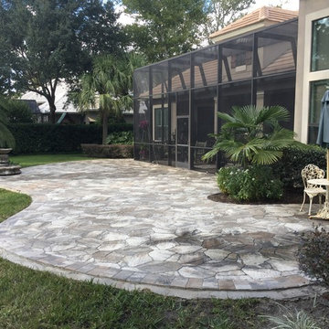 New patio as extension of screened lanai.