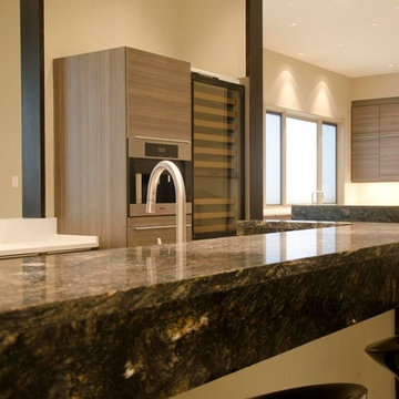 Modern kitchen and bar for new home in Memoral