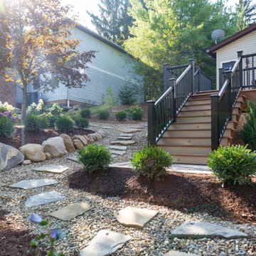 AZEK Decking with Cable Railing, Unilock Patio, Water Proof Ceiling & Landscape