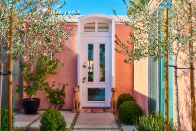 Inspiration for a mid-century modern exterior home remodel in Orange County