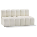 Meridian Furniture - Arc Vegan Leather Upholstered 2-Pc. Modular Sofa, Cream - Unleash modern opulence with the Arc Vegan Leather 2pc. Sectional. Crafted for the modern connoisseur, this Sectional injects an air of refined luxury into any space. Its sleek silhouette, upholstered in supple cream vegan leather, exudes timeless sophistication while the deep channel tufting adds textural intrigue, further elevating the chair's visual appeal. The modular design makes it a versatile chameleon, effortlessly adapting to your evolving needs and preferences. Whether you envision it gracing a chic living room corner, basking in the glow of a bedroom window, or adding a touch of drama to a home office, the Arc seamlessly complements your unique interior aesthetic.
