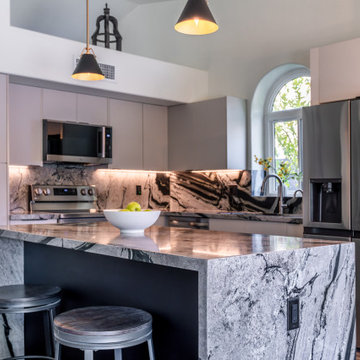 Matte Ivory Kitchen Remodel with Leathered Granite in Ahwautukee, AZ