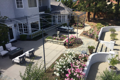 Photo of a huge french country full sun backyard stone landscaping in San Diego.