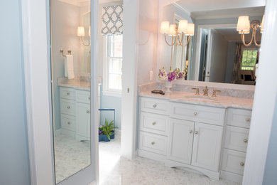Doorless shower - small transitional master white tile and mosaic tile marble floor doorless shower idea in DC Metro with an undermount sink, flat-panel cabinets, gray cabinets, marble countertops and blue walls