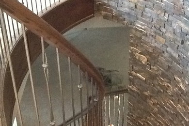 Mountain style staircase photo in Calgary