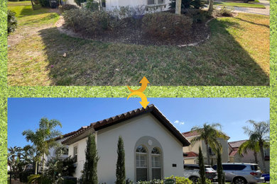 Inspiration for a mid-sized mediterranean full sun front yard concrete paver and stone fence landscaping in Orlando for summer.