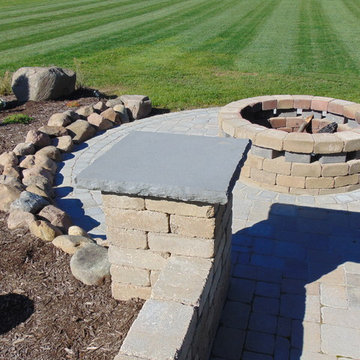 Simple addition to Patio with rock accents and mulch bed