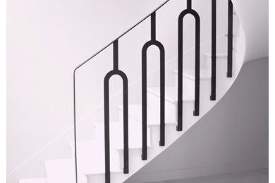 Mid-sized arts and crafts staircase photo in Other