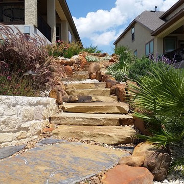 Multi-Level Patio with Hot Tub Water Feature and Boulder Staircase