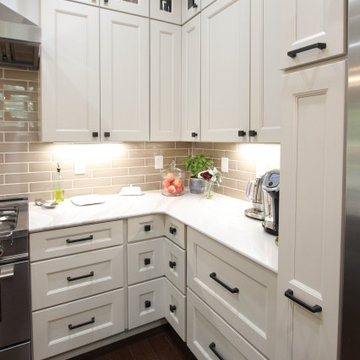 White Kitchen with Espresso Island, Galley Sink, Cambria Britannica Countertop