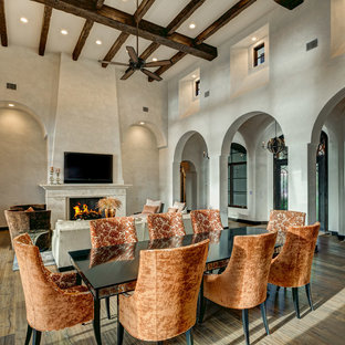 Design ideas for a mediterranean open plan dining in Austin with beige walls and dark hardwood floors.